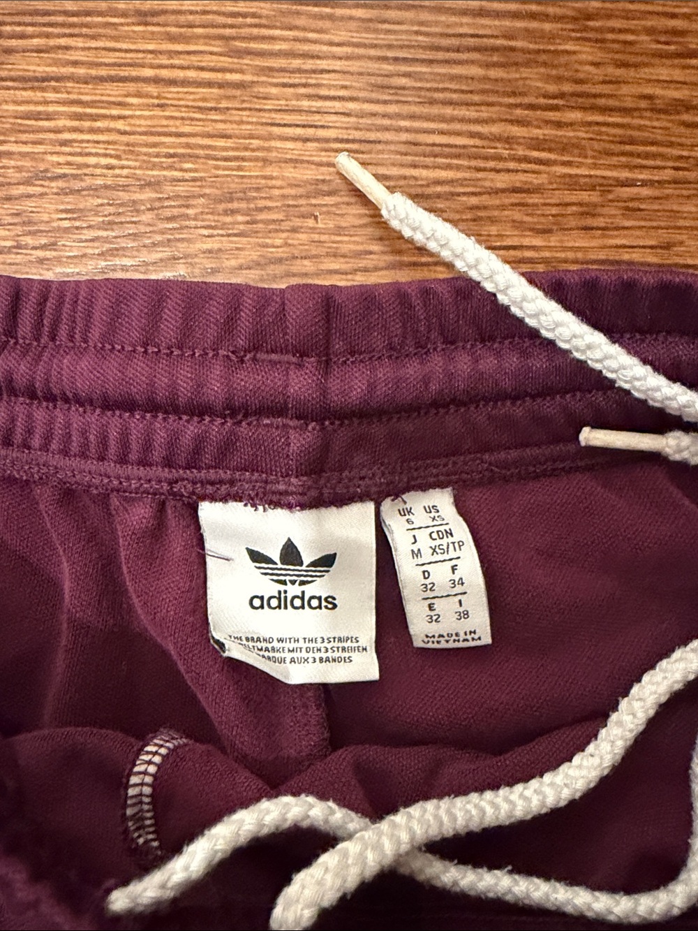 adidas Women's Burgundy Athletic Shorts with White Trim - Picture 3 of 4